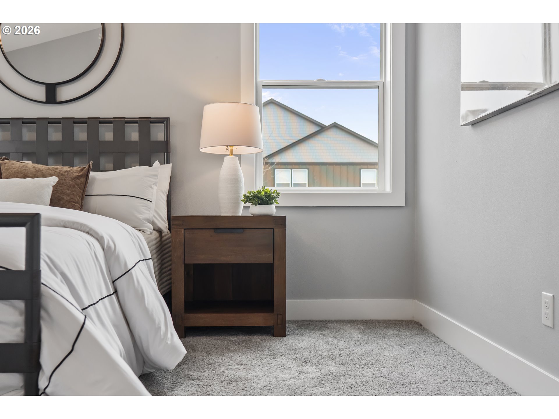 819 Riley Drive Northeast Silverton, OR 97381 - Photo 16 of 38 a bed room with a bed and a painting on the wall