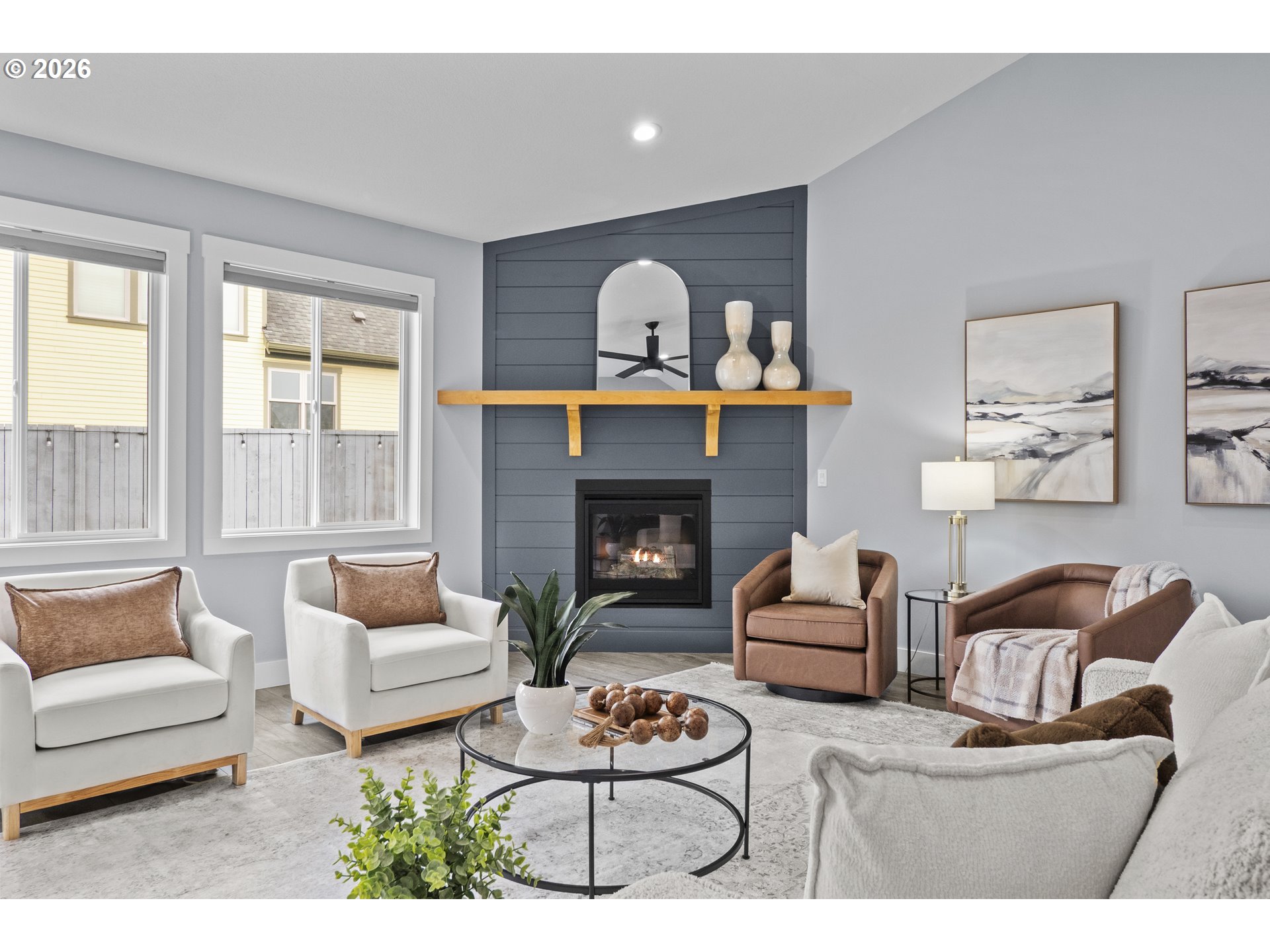 819 Riley Drive Northeast Silverton, OR 97381 - Photo 2 of 38 a living room with furniture and a fireplace