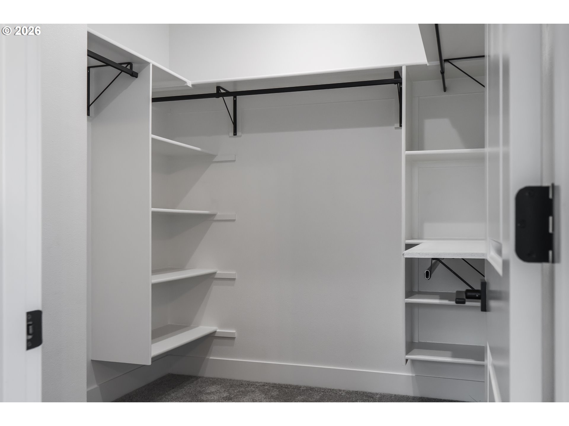 819 Riley Drive Northeast Silverton, OR 97381 - Photo 22 of 38 a view of walk in closet with clothes and shoes