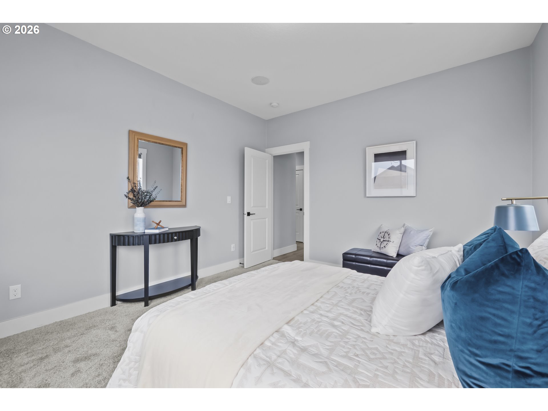 819 Riley Drive Northeast Silverton, OR 97381 - Photo 25 of 38 a bedroom with a bed and a table in it