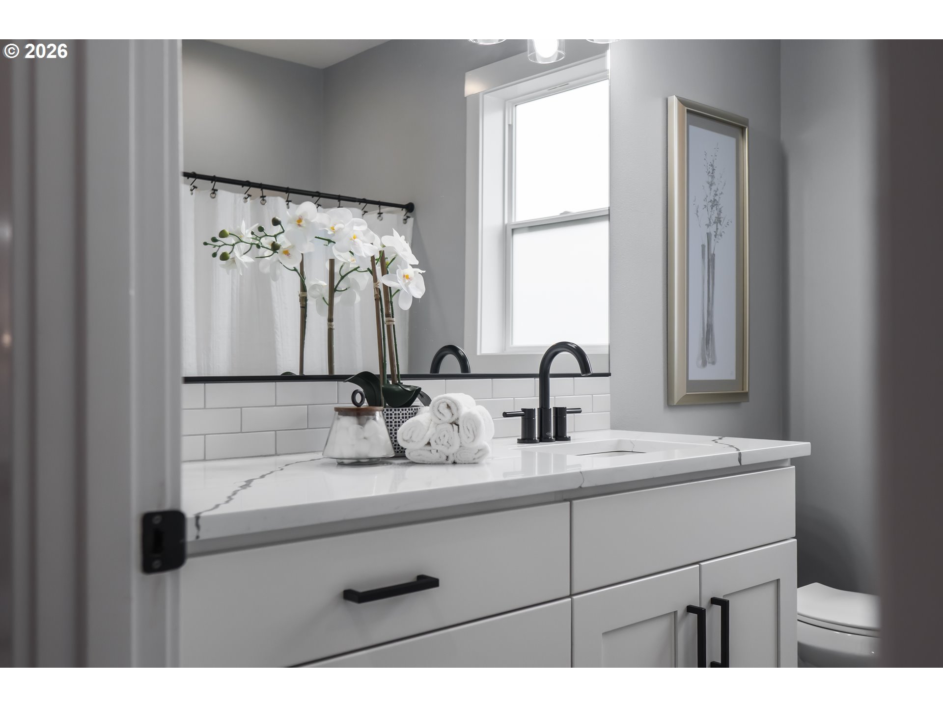 819 Riley Drive Northeast Silverton, OR 97381 - Photo 28 of 38 a bathroom with a sink and a mirror