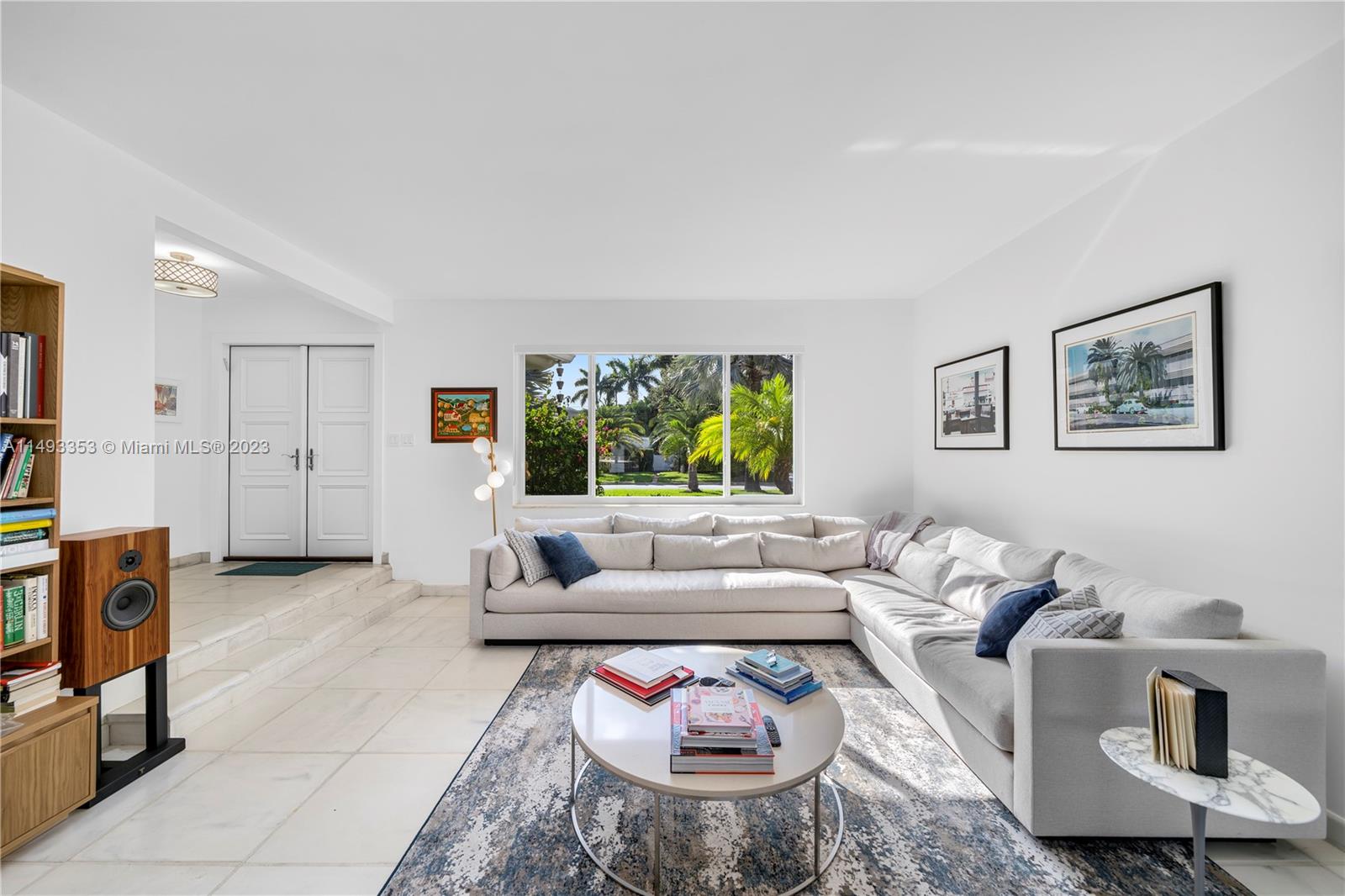 1277 Biscaya Drive Surfside, FL 33154 - Photo 3 of 13 a living room with furniture and a large window
