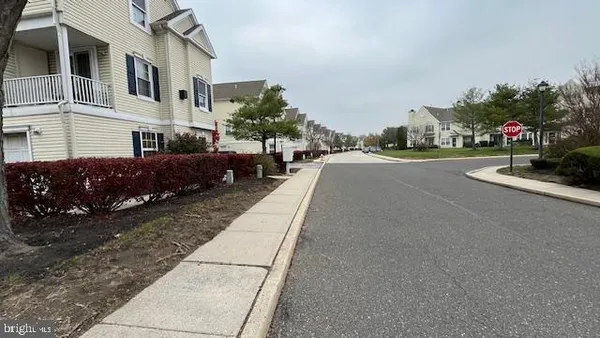 a view of a street with cars