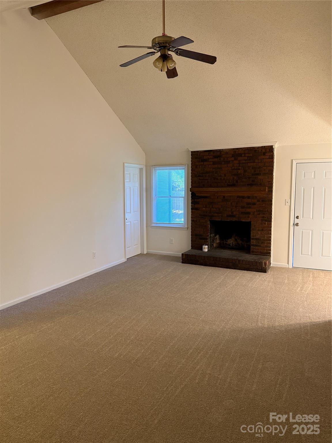 12800 Levins Hall Road Huntersville, NC 28078 - Photo 4 of 16 a view of empty room with fireplace