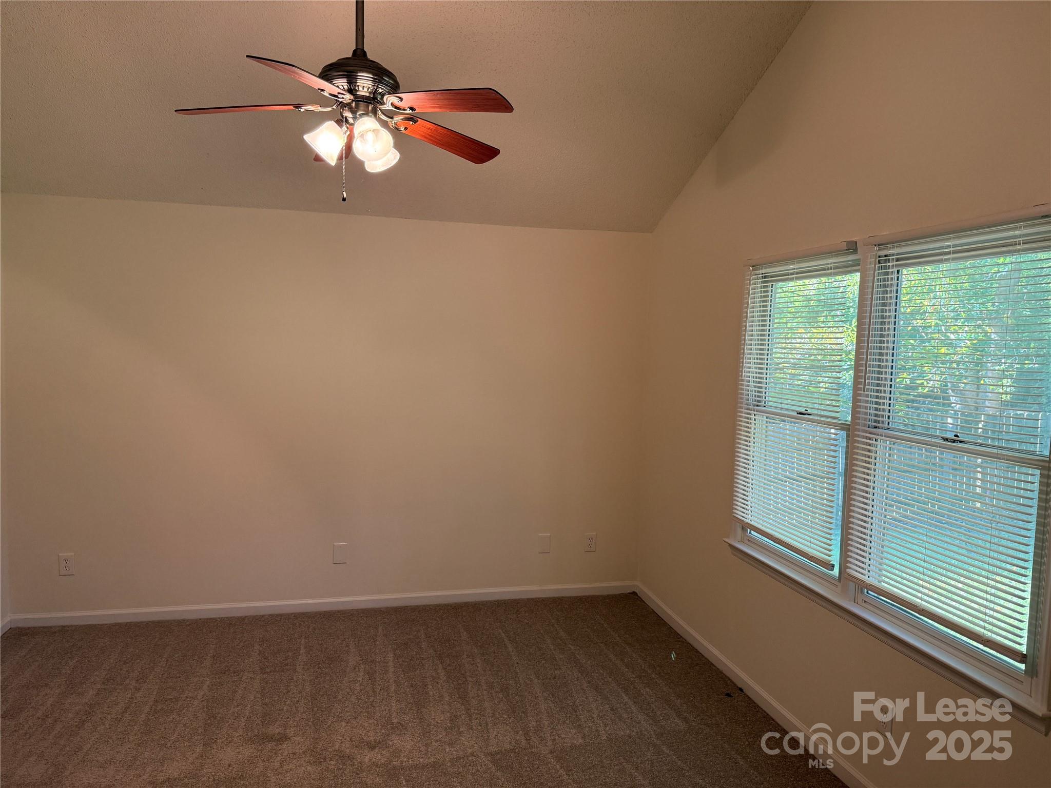 12800 Levins Hall Road Huntersville, NC 28078 - Photo 10 of 16 an empty room with a window