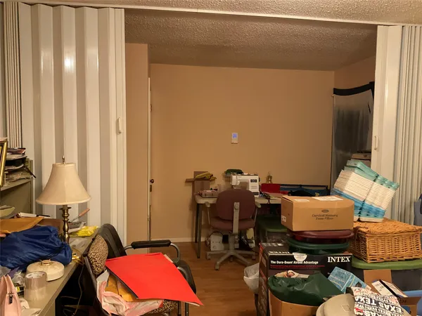 a workspace with furniture and rug