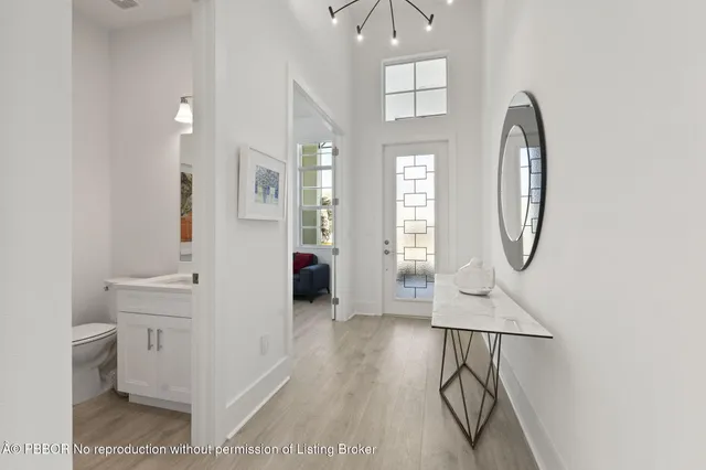 a view of a livingroom with furniture and windows