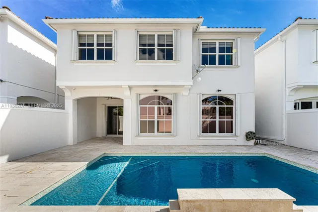 a view of a backyard of the house