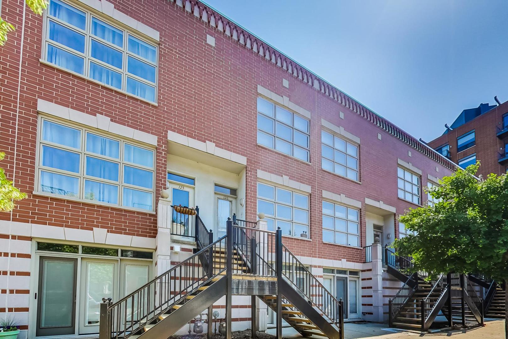855 West Erie Street, Unit 126 Chicago, IL 60642 - Photo 1 of 24 a front view of a building