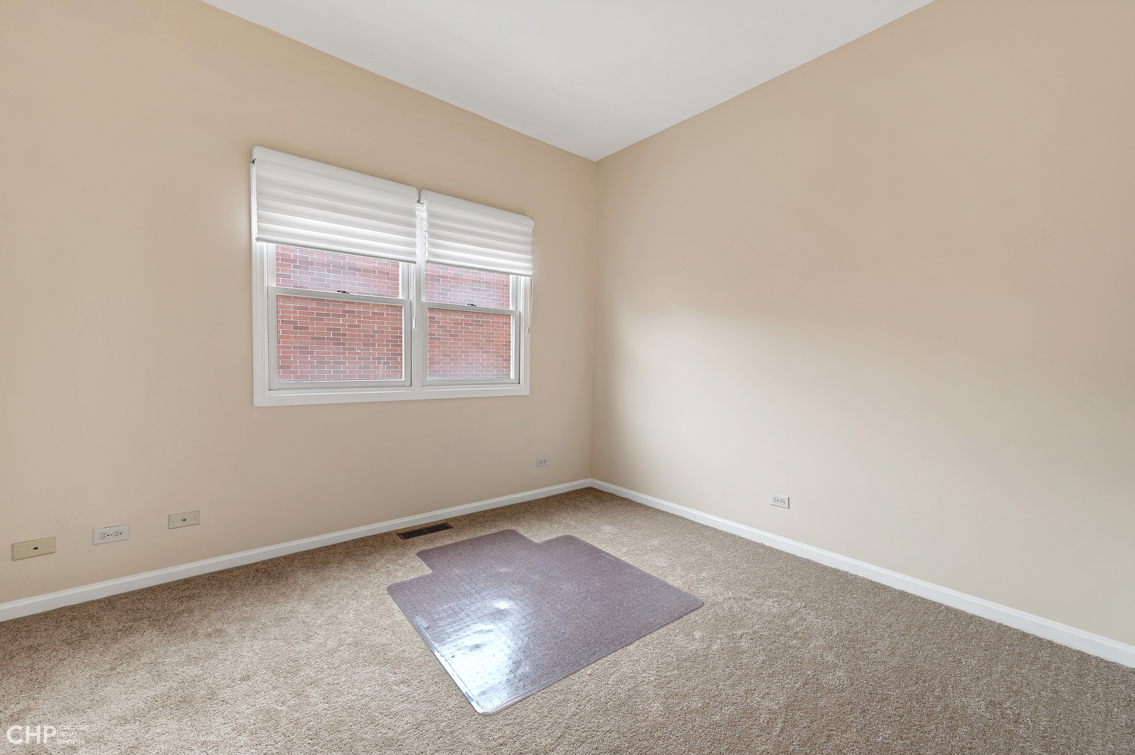 855 West Erie Street, Unit 126 Chicago, IL 60642 - Photo 11 of 24 an empty room with a window