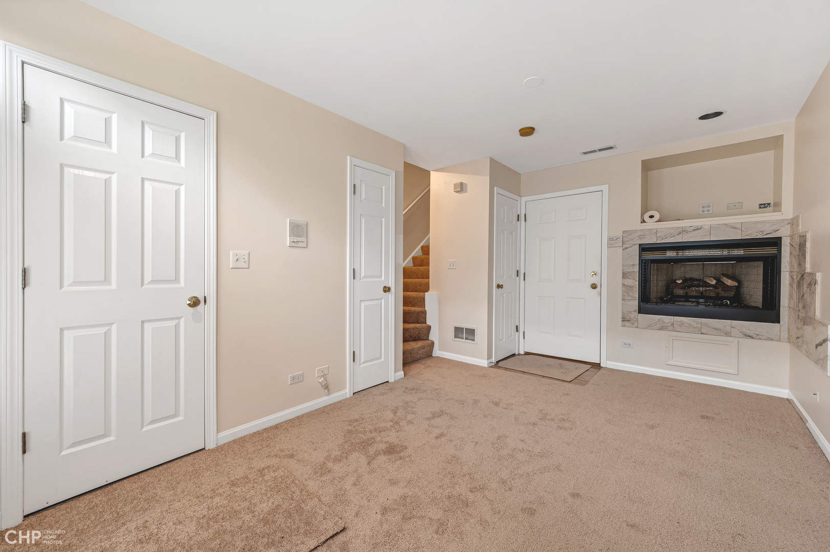 855 West Erie Street, Unit 126 Chicago, IL 60642 - Photo 13 of 24 a view of empty room with a fireplace