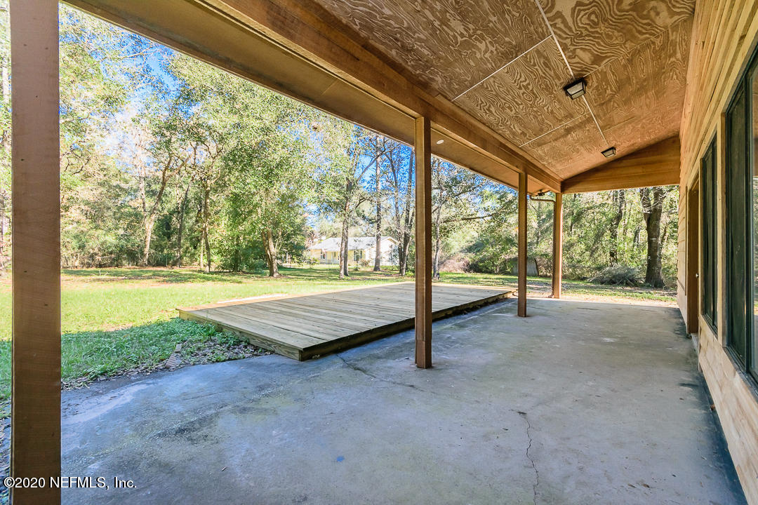 4449 Tumbleweed Road Middleburg, FL 32068 - Photo 20 of 21 Rear Covered Porch + Deck