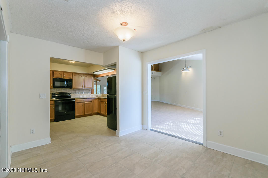 4449 Tumbleweed Road Middleburg, FL 32068 - Photo 5 of 21 Kitchen & Game Room View