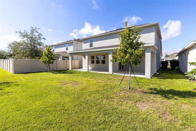 a house view with a swimming pool