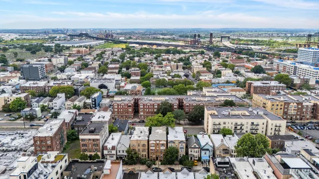 an aerial view of a city with lots of residential buildings