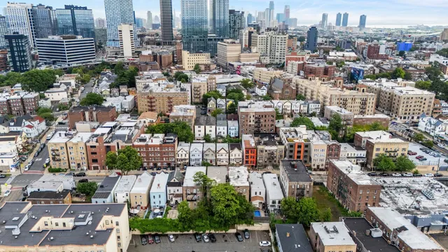 a view of a city with tall buildings