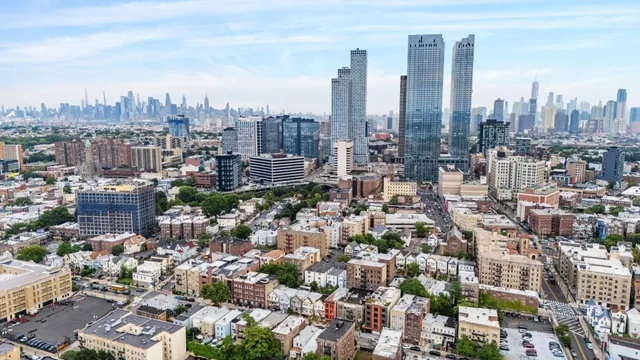 a view of a city with tall buildings