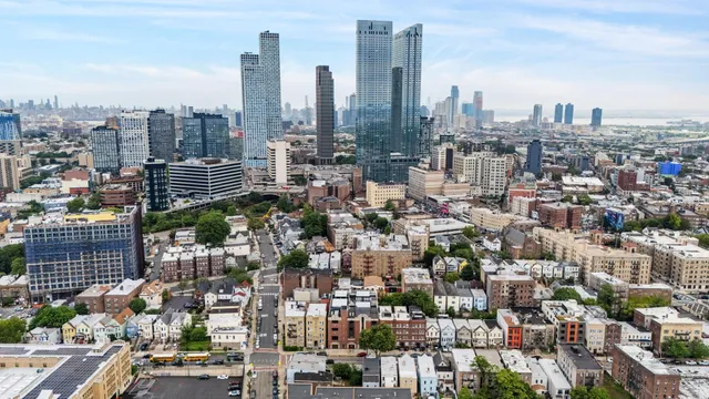 a view of a city with tall buildings