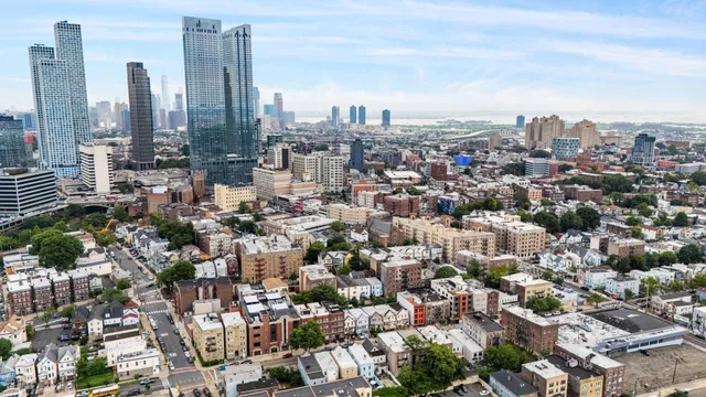 a view of a city with tall buildings