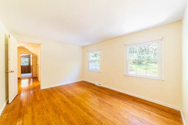 a view of an empty room and window