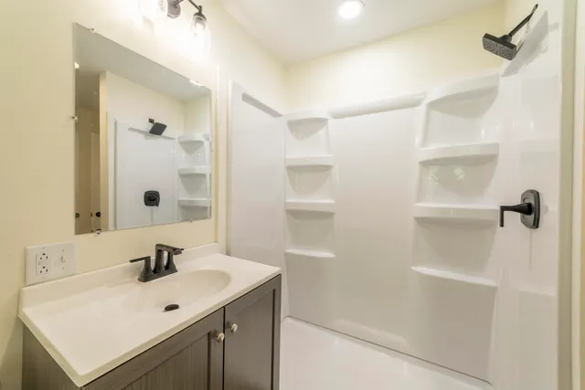 a view of backyard with a deck