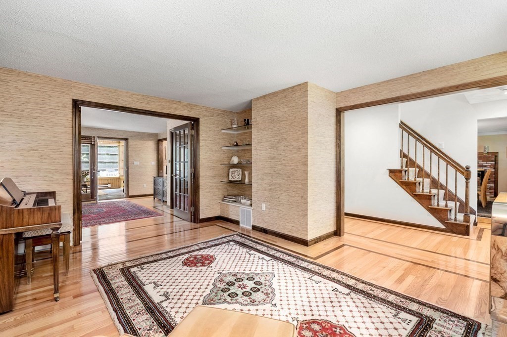 7 Ridge Hill Way Andover, MA 01810 - Photo 11 of 42 a bedroom with furniture and a rug