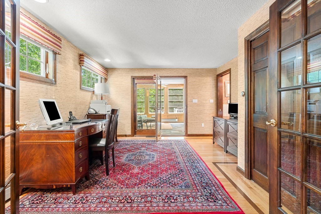 7 Ridge Hill Way Andover, MA 01810 - Photo 13 of 42 a living room with furniture rug and a table