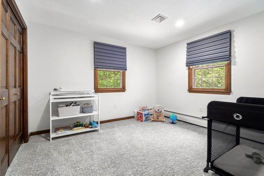 7 Ridge Hill Way Andover, MA 01810 - Photo 34 of 42 wooden floor and windows in a room