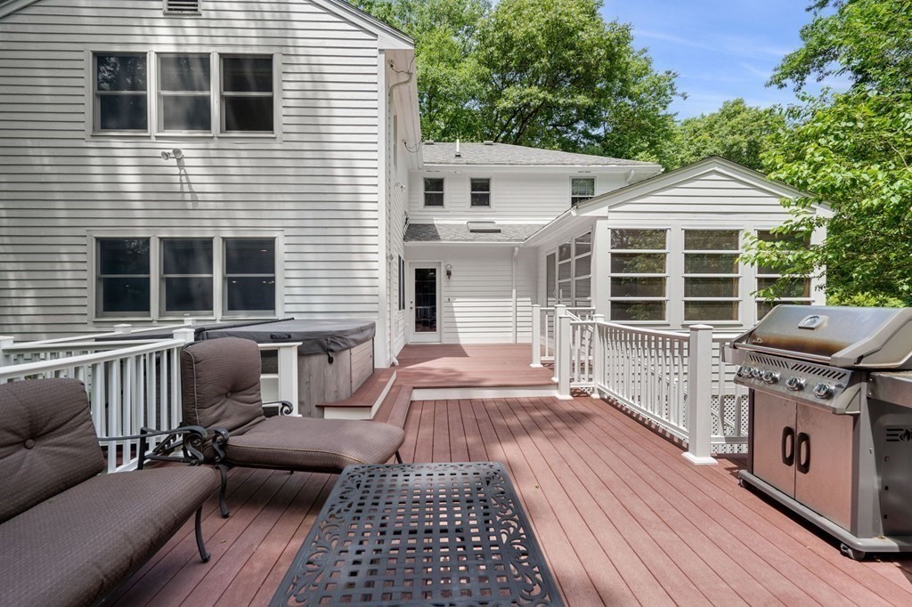 7 Ridge Hill Way Andover, MA 01810 - Photo 38 of 42 a view of a patio with couches chairs and wooden floor