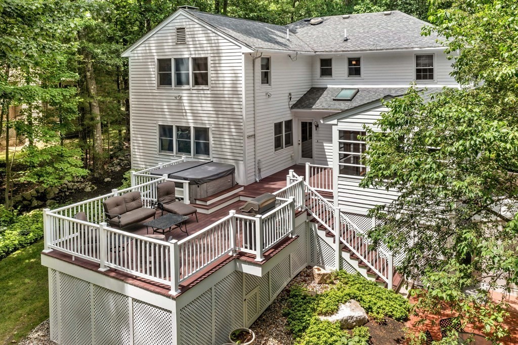7 Ridge Hill Way Andover, MA 01810 - Photo 5 of 42 a front view of a house with garden and trees