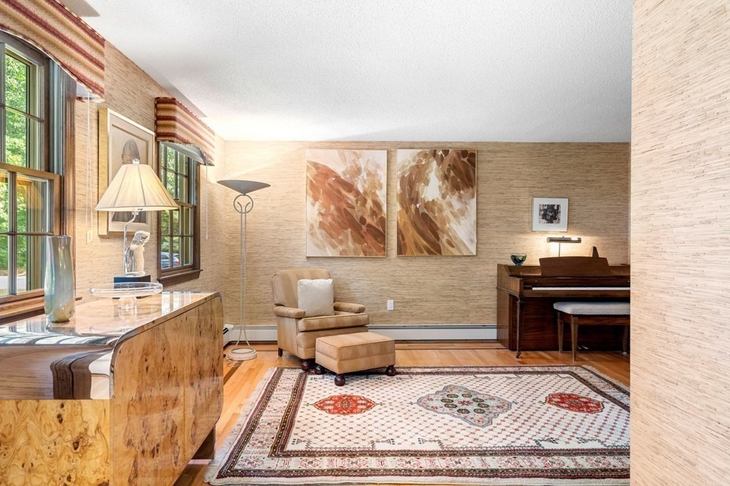 7 Ridge Hill Way Andover, MA 01810 - Photo 10 of 42 a living room with furniture and a rug