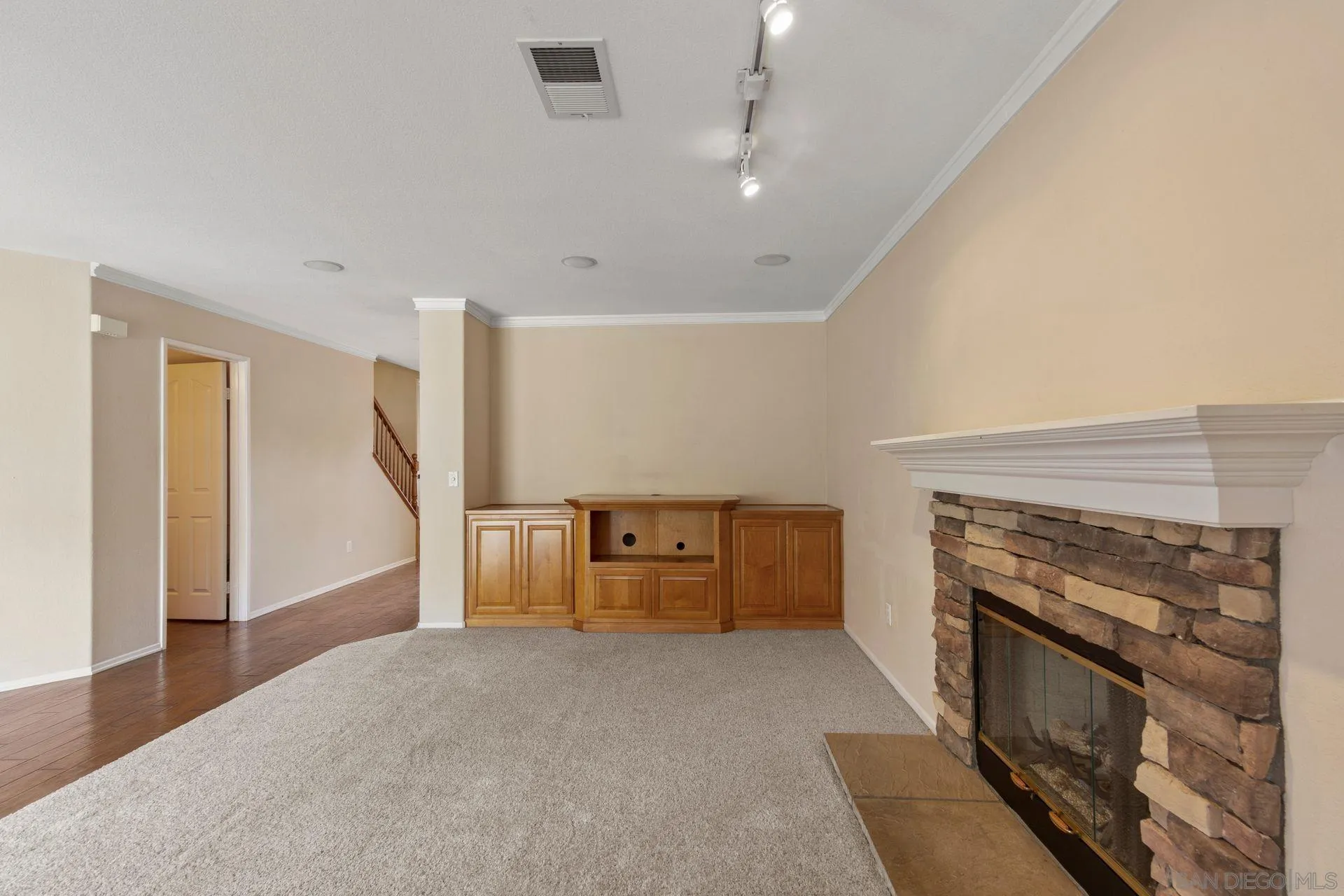 302 La Soledad Way Oceanside, CA 92057 - Photo 21 of 37 a living room with furniture and a fireplace