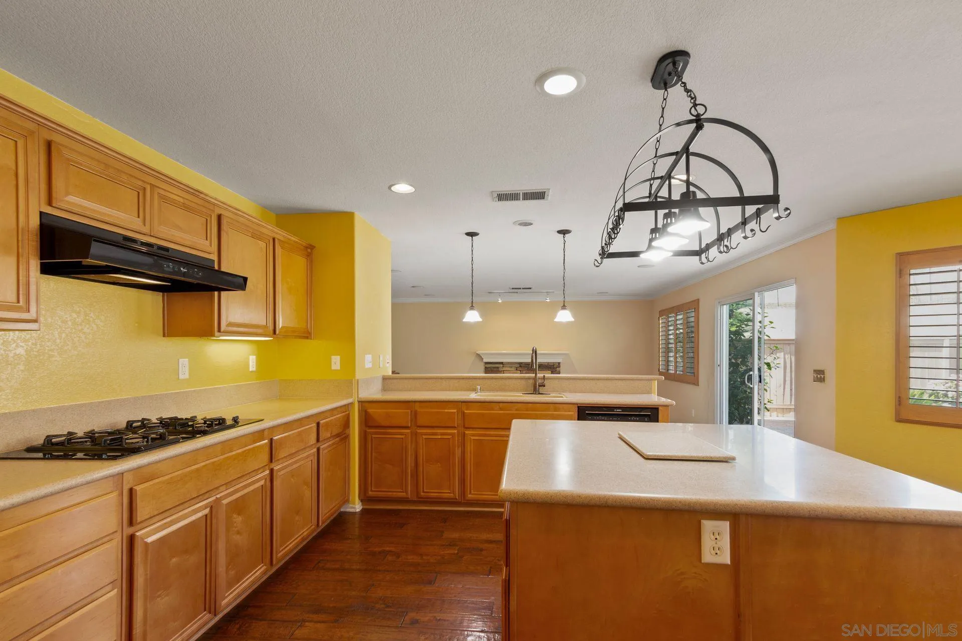 302 La Soledad Way Oceanside, CA 92057 - Photo 26 of 37 a kitchen with stainless steel appliances granite countertop a sink a stove top oven a counter space and cabinets