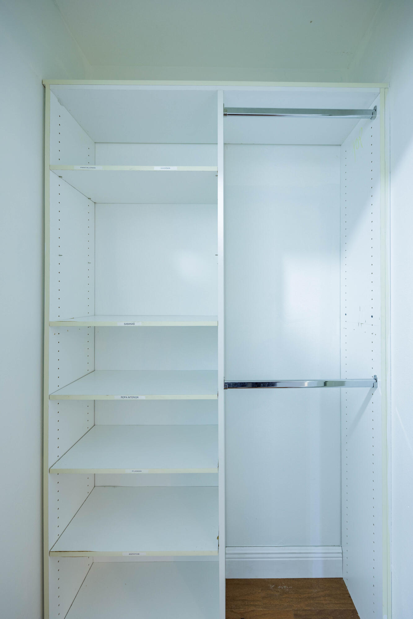 3001 Linton Boulevard, Unit 213C Delray Beach, FL 33445 - Photo 22 of 35 a view of walk in closet with empty racks