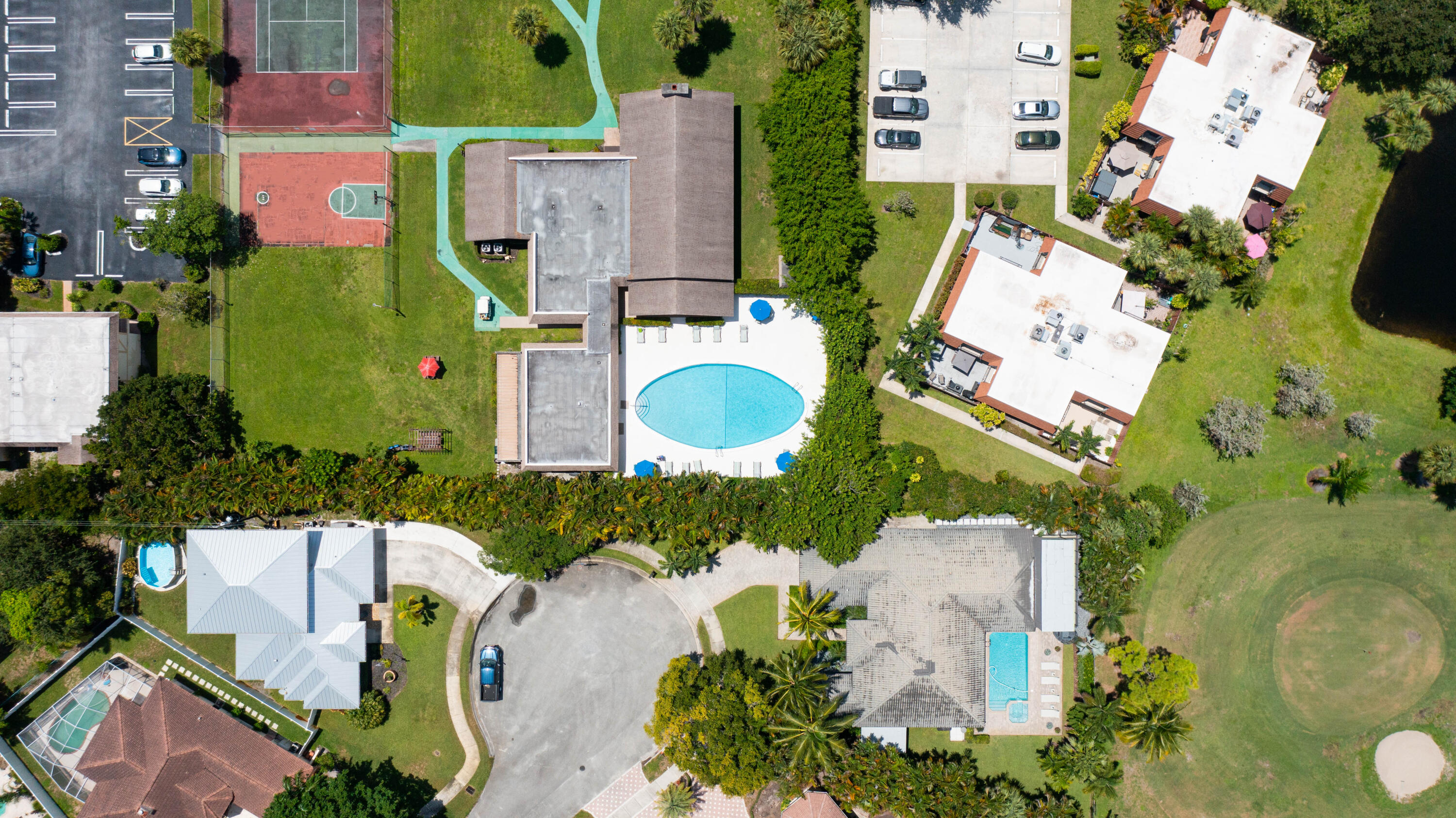 3001 Linton Boulevard, Unit 213C Delray Beach, FL 33445 - Photo 31 of 35 an aerial view of a house with a swimming pool