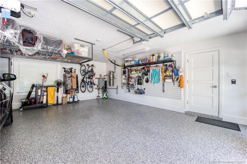 121 Hillcrest Drive Stuart, FL 34996 - Photo 41 of 65 a view of a storage room with a lot of stuff