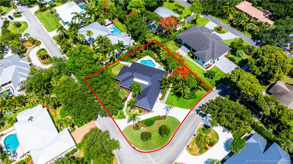 121 Hillcrest Drive Stuart, FL 34996 - Photo 54 of 65 an aerial view of residential house with outdoor space and swimming pool