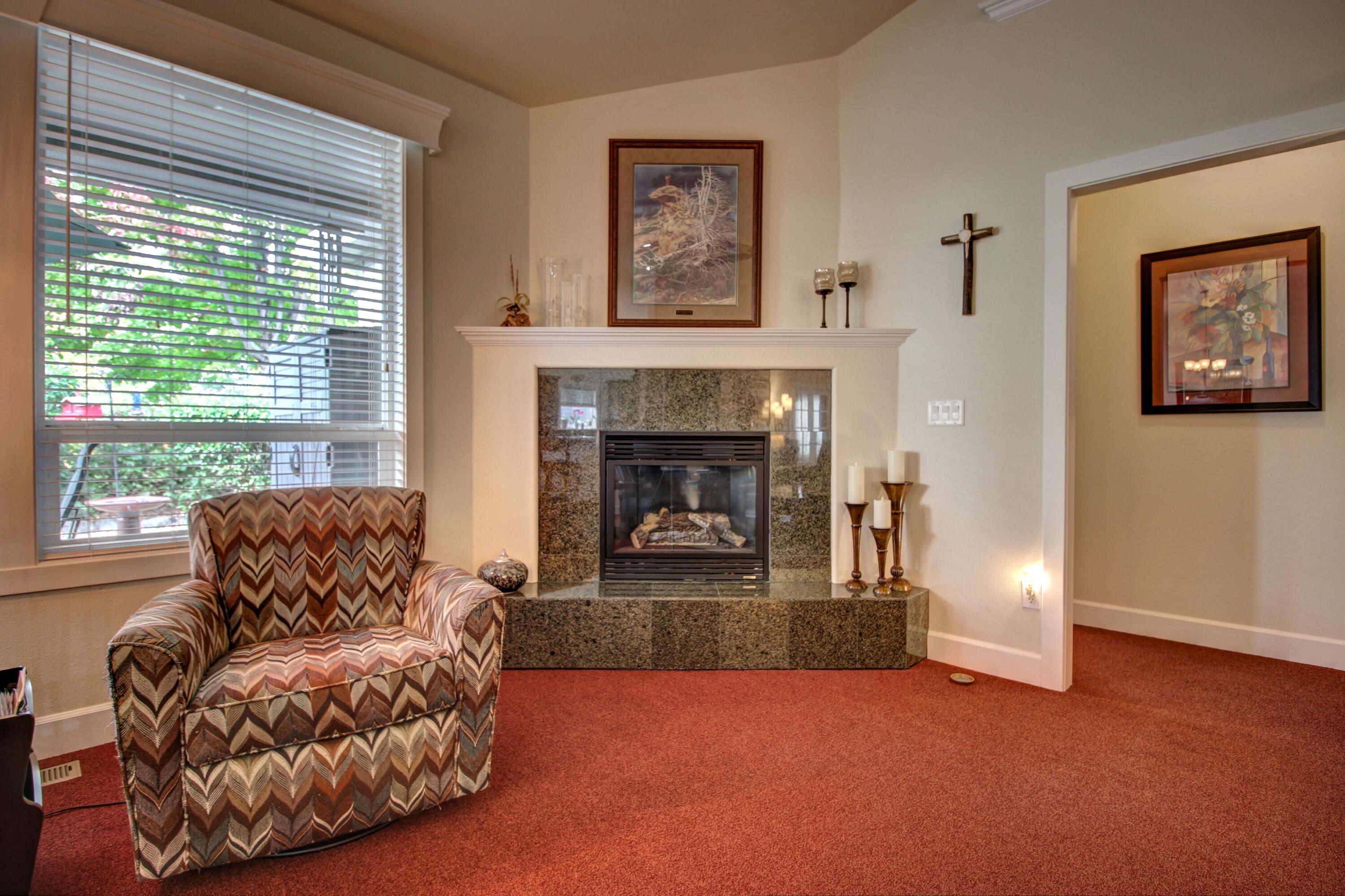 33 Broken Stone Way Eagle Point, OR 97524 - Photo 13 of 33 a living room with furniture and a fireplace