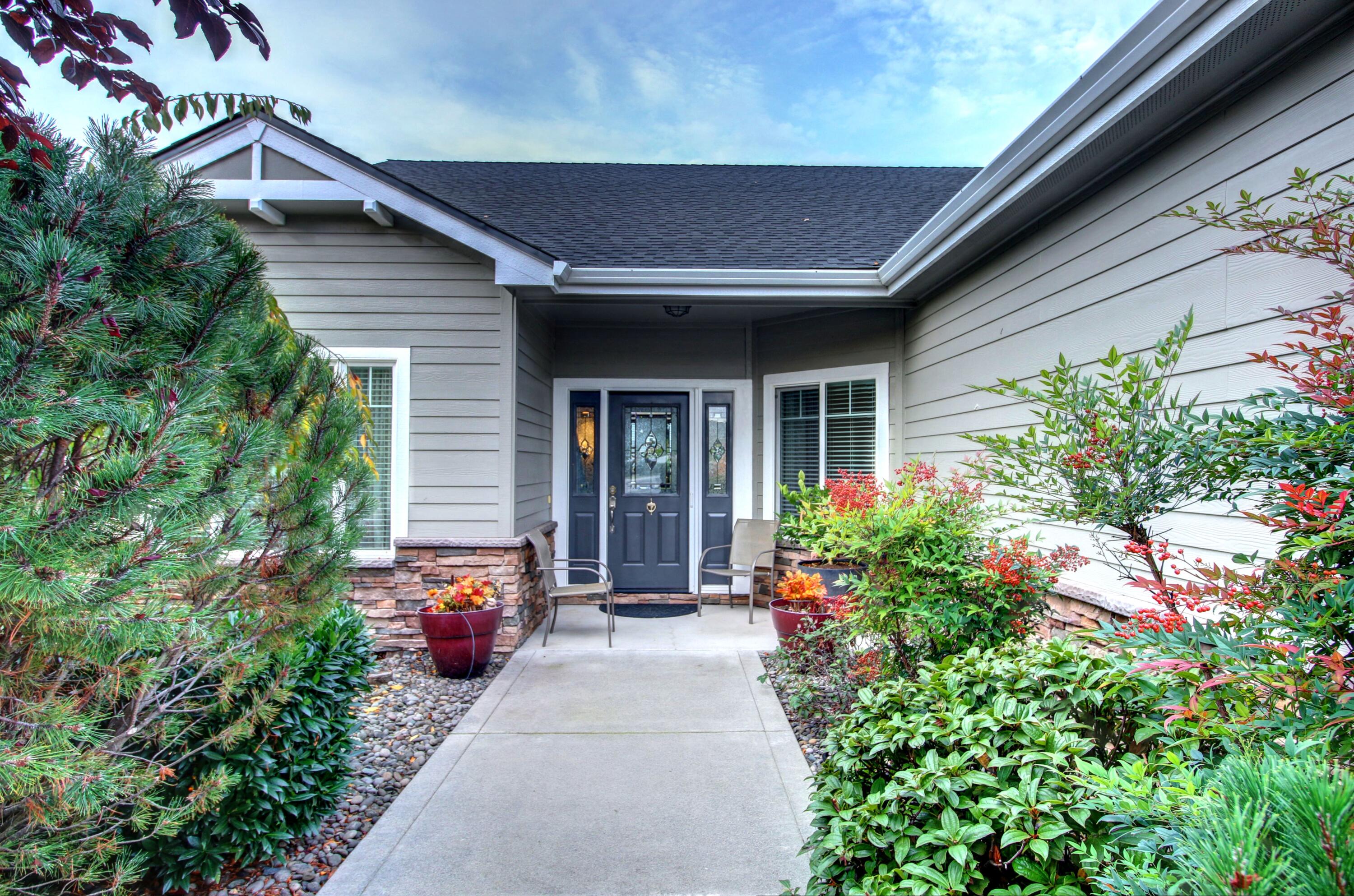 33 Broken Stone Way Eagle Point, OR 97524 - Photo 2 of 33 a view of a house with potted plants