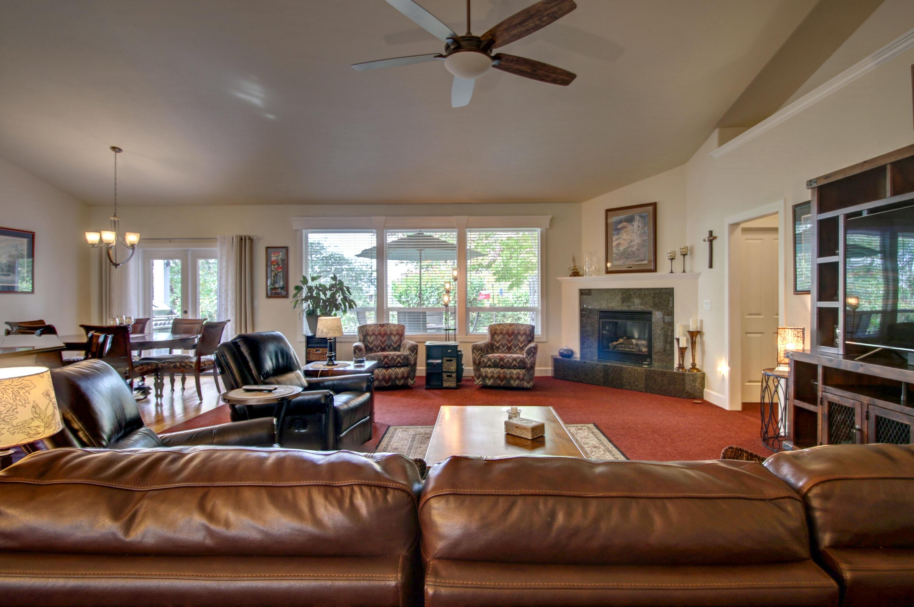 33 Broken Stone Way Eagle Point, OR 97524 - Photo 10 of 33 a living room with furniture and a fireplace