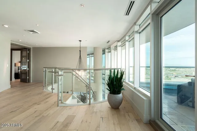 a bathroom with a double vanity sink toilet and shower