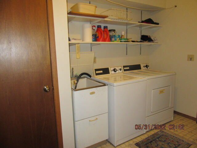 Undisclosed Address Pleasant Prairie, WI 53158 - Photo 13 of 13 a utility room with dryer and washer