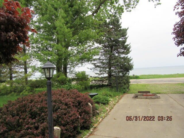 Undisclosed Address Pleasant Prairie, WI 53158 - Photo 3 of 13 a view of a park with large trees