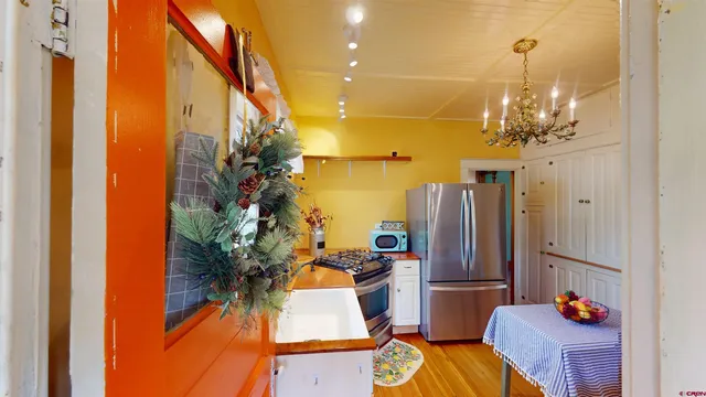 a view of a dining room with furniture