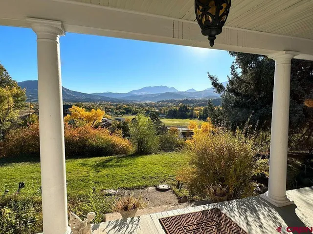 a view of balcony with garden