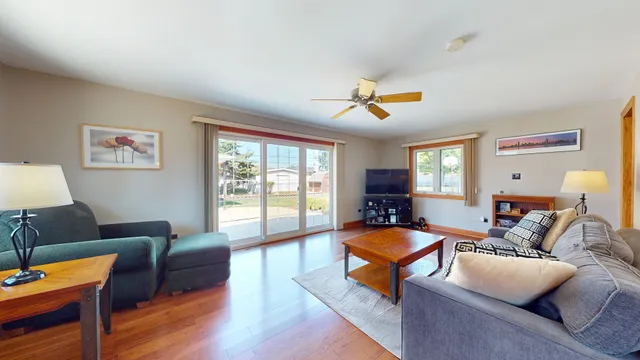 a living room with furniture and a window