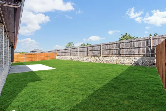 a view of a lake with a big yard