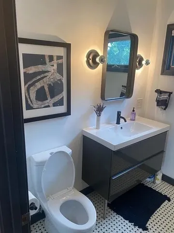 a view of a wooden deck with furniture