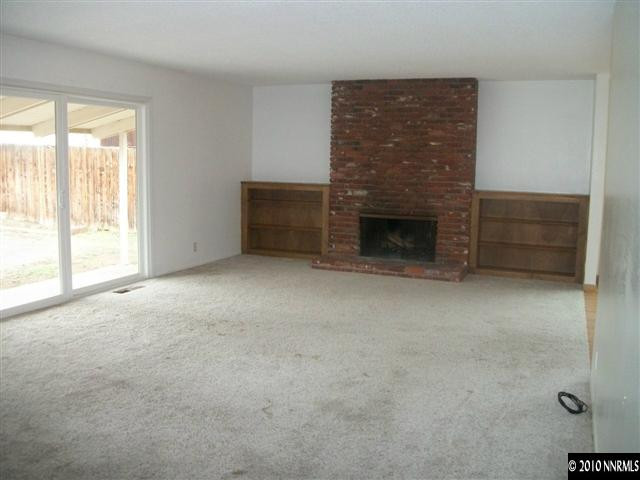 280 Wildrose Drive Reno, NV 89509 - Photo 2 of 9 a view of empty room with a fireplace