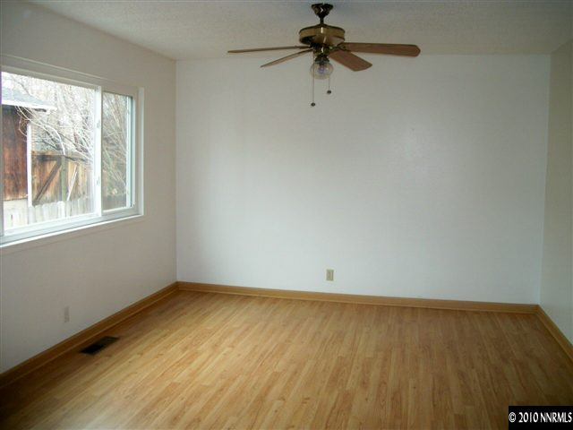 280 Wildrose Drive Reno, NV 89509 - Photo 5 of 9 wooden floor in an empty room with a window